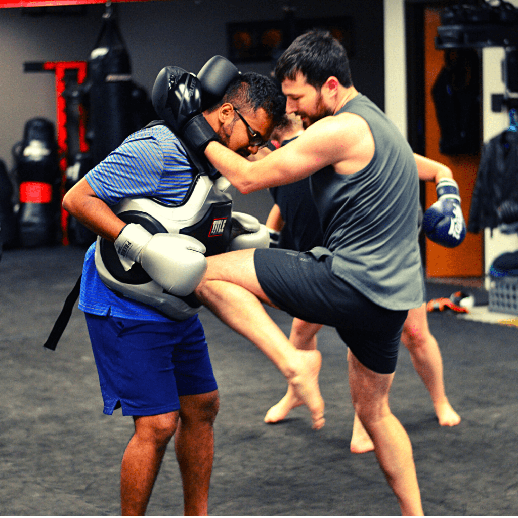Clinch knee strike in our Austin Muay Thai class